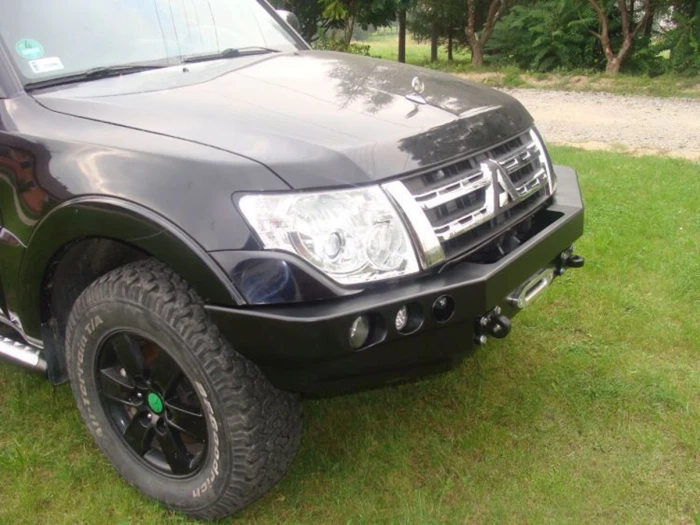 PARE CHOC AVANT MITSUBICHI PAJERO IV 06-15